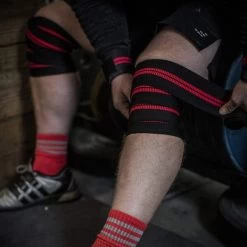 Harbinger Red Line Knee Wraps 9 Harbinger Red Line Knee Wraps -Professional Fitness Store 9a1756fd0c741126d7bbd4b692ccbd91 5d0a752575de5 600x600 1